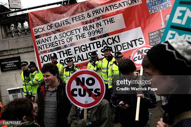 Protesters gather to demonstrate against education cuts, tuition increases and austerity on November 21, 2012 in London, England. The demonstration...