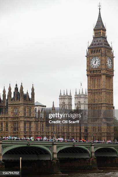 Students protest in front of the Houses of Parliament against the rising costs of further education on November 21, 2012 in London, England. The...