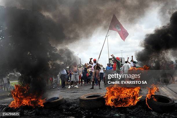 Activists of the Landless Movement block with burning tyres the BR-020 road that links Brasilia with Sao Paulo and Rio de Janeiro, during a protest...