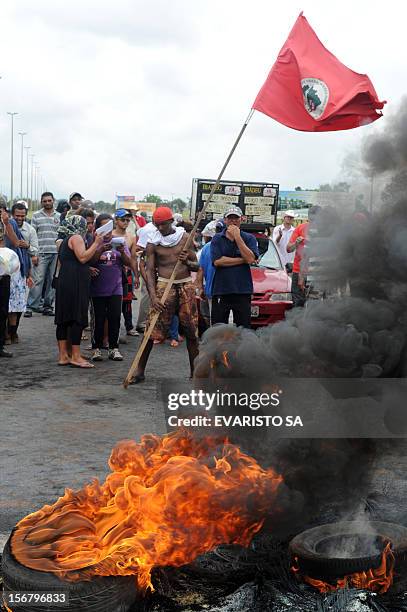 Activists of the Landless Movement block with burning tyres the BR-020 road that links Brasilia with Sao Paulo and Rio de Janeiro, during a protest...