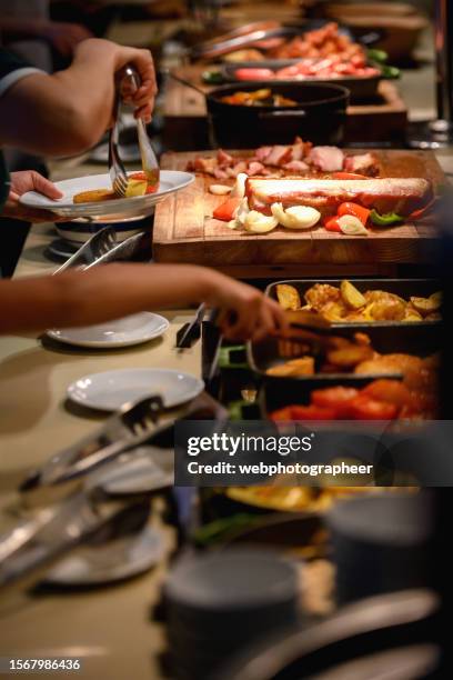 buffet full of delicious food - canteen stock pictures, royalty-free photos & images