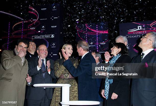 Mayor of Paris Bertrand Delanoe and actress Diane Kruger attend the switching on of the Christmas lights along the Champs Elysees on November 21,...