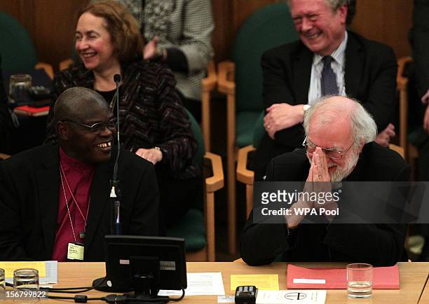Dr John Sentamu , Archbishop of York, and Dr Rowan Williams, the outgoing Archbishop of Canterbury, share a laugh during his farewell tributes at a...