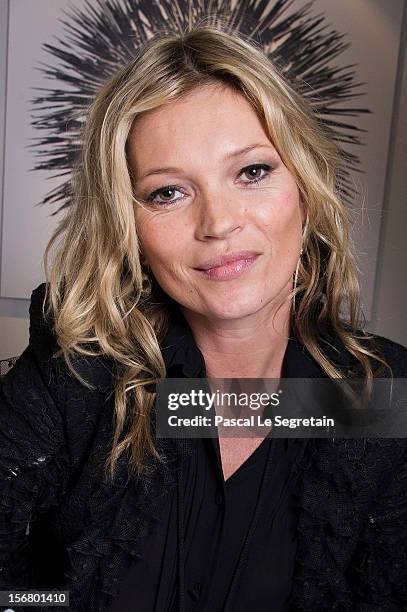 Kate Moss attends a signing session for the book 'Kate: The Kate Moss Book' at Colette on November 21, 2012 in Paris, France.