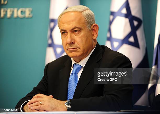 In this handout image supplied by the Israeli Government Press Office , Prime Minister Benjamin Netanyahu delivers a speech at his office on November...