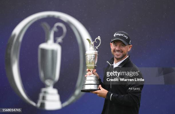 Brian Harman of the United States poses with the Claret Jug after winning during the final round of The 151st Open Championship at Royal Liverpool...