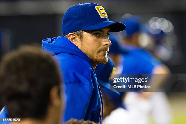 Andre Rienzo of Team Brazil looks on from the dugout during Game 6 of the Qualifying Round of the World Baseball Classic against Team Panama at Rod...