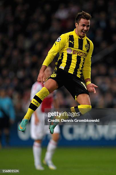 Mario Goetze of Dortmund celebrates scoring his team's second goal during the UEFA Champions League Group D match between Ajax Amsterdam and Borussia...