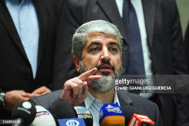 Hamas Leader Khaled Meshaal gestures as he gives a press conference at the Intercontinental Hotel on November 21, 2012 in Cairo, hours after Egyptian...