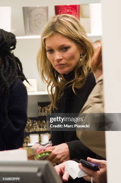 Supermodel Kate Moss is seen at the 'Colette' store on November 21, 2012 in Paris, France.