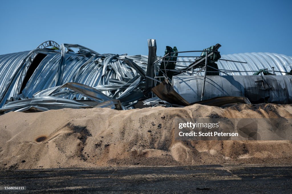 Ukrainians Clean Up After Russian Rocket Attacks On Grain Stores Near Odesa