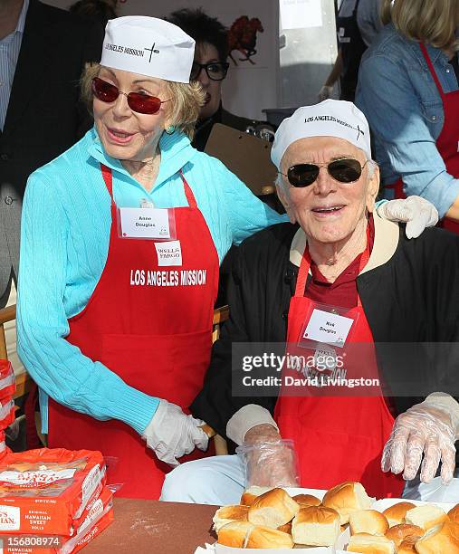 Actor Kirk Douglas and wife Anne Douglas attend the Los Angeles Mission's Thanksgiving for skid row homeless at the Los Angeles Mission on November...