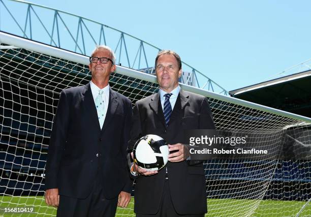 David Gallop and Socceroos head coach Holger Osieck pose for the media during a FFA Announcement at Etihad Stadium on November 22, 2012 in Melbourne,...