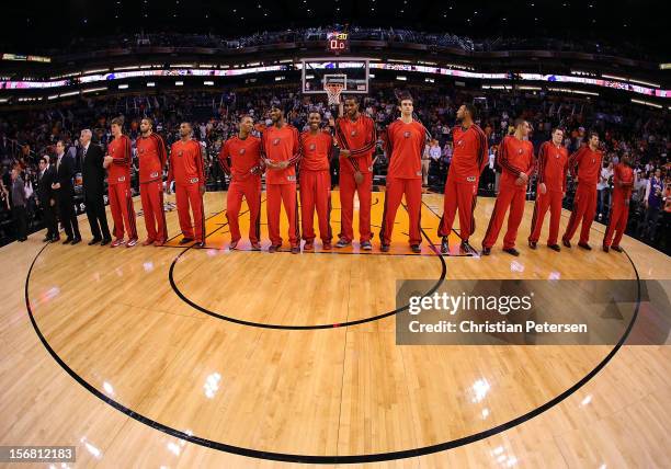 The Portland Trail Blazers line up for the National Anthem before the NBA game against the Phoenix Suns at US Airways Center on November 21, 2012 in...