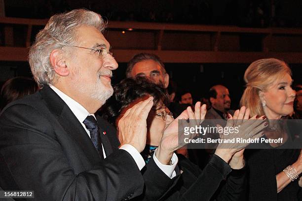 World-famous tenor and conductor Placido Domingo applauds during his induction ceremony as Goodwill Ambassador of UNESCO, at UNESCO on November 21,...