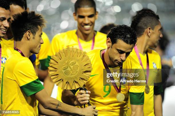 Neymar and Fred celebrate with the trophy of the Superclasico de Las Américas between Argentina and Brazil at Bombonera Stadium on November 21, 2012...