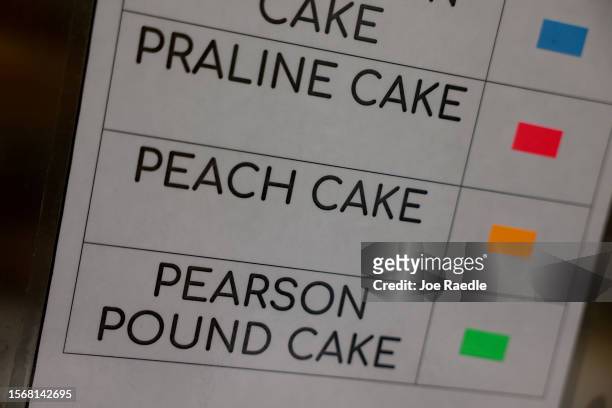 Some of the cakes the baker makes, including a peach cake, are listed at Pearson Farm on July 24, 2023 in Fort Valley, Georgia. Due to weather...