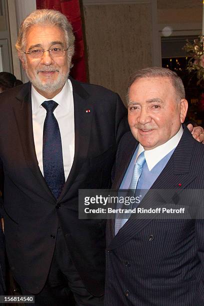 Tenor/conductor Placido Domingo and Levon Sayan attend Domingo's induction ceremony as Goodwill Ambassador of UNESCO at UNESCO on November 21, 2012...