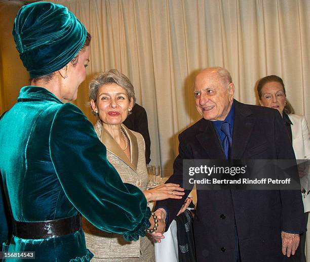 Pierre Berge greets Sheikha Mozah, the wife of the Emir of Qatar as UNESCO Secretary General Irina Bokova looks on, as they attend Placido Domingo's...