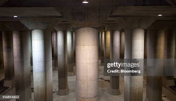 Stone pillars stand in the surge tank area of the Metropolitan Area Outer Underground Discharge Channel in Kasukabe City, Saitama Prefecture, Japan,...