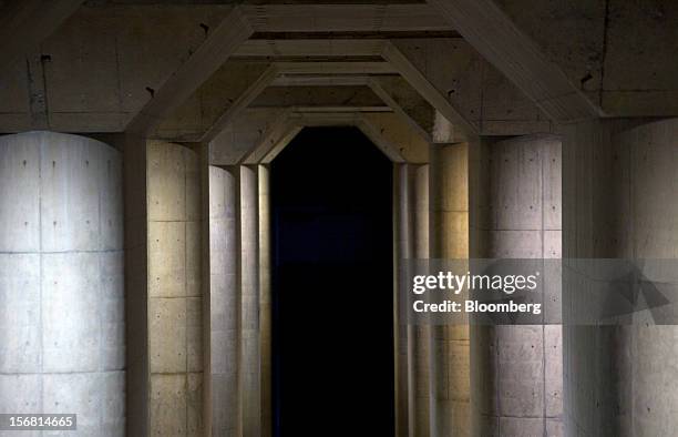 Stone pillars stand in the surge tank area of the Metropolitan Area Outer Underground Discharge Channel in Kasukabe City, Saitama Prefecture, Japan,...