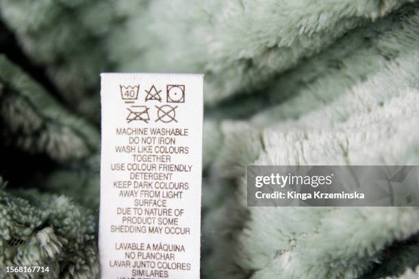 laundry symbols - fabric tag stock pictures, royalty-free photos & images