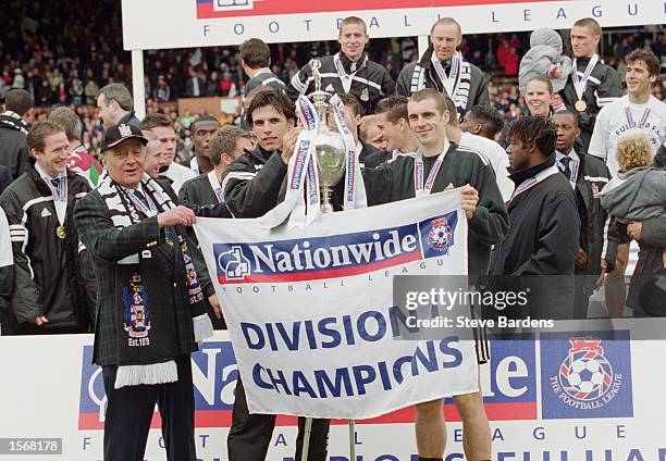 Fulham chairman Mohamed Al-Fayed , Chris Coleman , and Andy Melville of Fulham celebrate winning the title after the Nationwide League Division One...