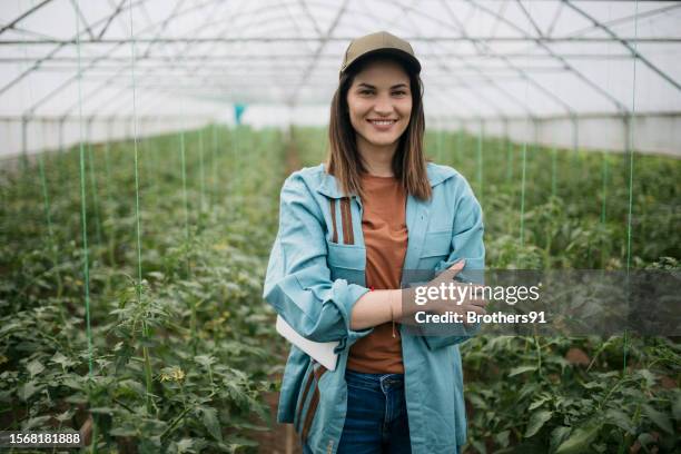 Portrait of a caucasian female greenhouse farm owner