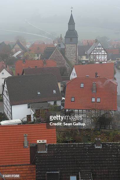 Fog hangs over half-timbered houses on November 18, 2012 in Trendelburg, Germany. Trendelburg lies along the "Fairy Tale Road" that leads through the...
