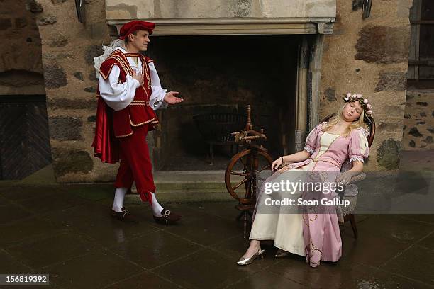 Prince Charming, actually actor Andreas Richhardt, discovers Sleeping Beauty, played by actress Elisabeth Knoche, in her 100-year sleep at Sababurg...