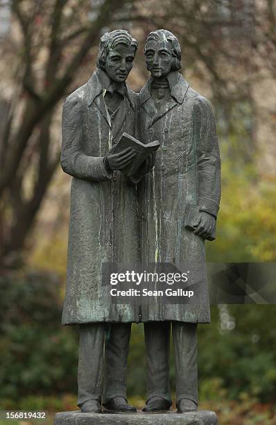 Memorial showing brothers Jacob and Wilhelm Grimm, authors of Grimms' Fairy Tales, stands in a small park on November 20, 2012 in Kassel, Germany.The...