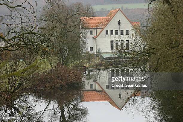 House stands reflected in a river on November 19, 2012 in Wuelmersen, Germany. Wuelmersen lies along the "Fairy Tale Road" that leads through the...