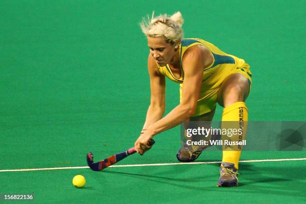 Edwina Bone of the Hockyroos hits the ball during day one of the 2012 International Super Series at Perth Hockey Stadium on November 22, 2012 in...