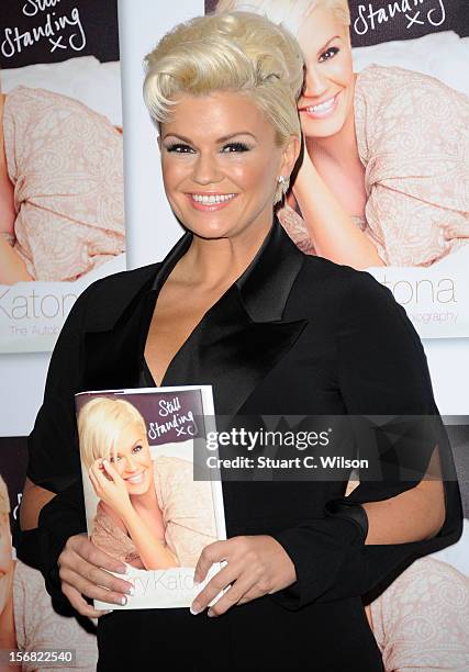Kerry Katona attends a photocall to launch her book 'Still Standing' at Century Club on November 22, 2012 in London, England.