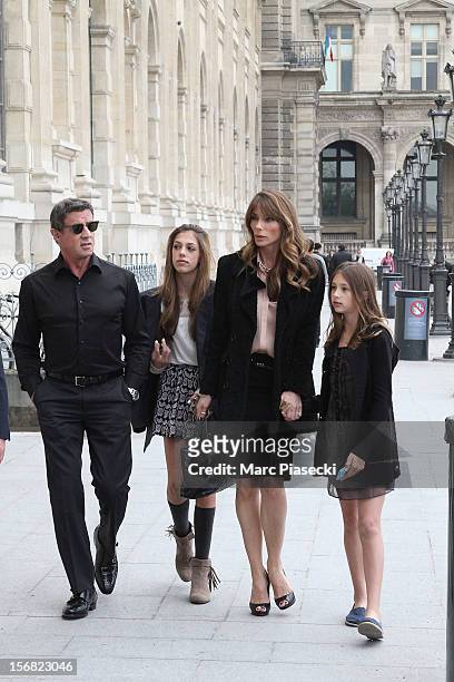 Actor Sylvester Stallone, his wife Jennifer Flavin, his daughters Scarlet Rose and Sisitine Rose are sighted in the 'Louvre' gardens on November 22,...
