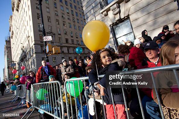 People line Central Park West for the 86th Annual Macy's Thanksgiving Day Parade November 22, 2012 in New York. Macy's donated tickets and...