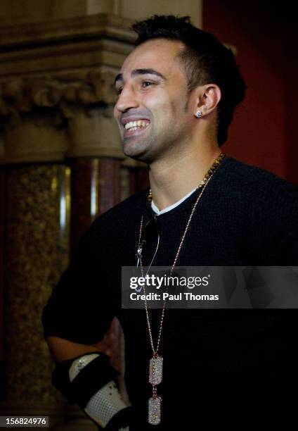 Boxer Paulie Malignaggi smiles during a media interview at the Ricky Hatton v Vyacheslav Senchenko Head-to-Head press conference at the Manchester...