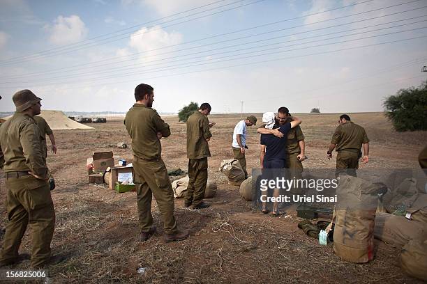 Israeli reserve soldiers leave the Gaza border area on November 22, 2012 near Israel's border with the Gaza Strip. The ceasefire between Israel and...