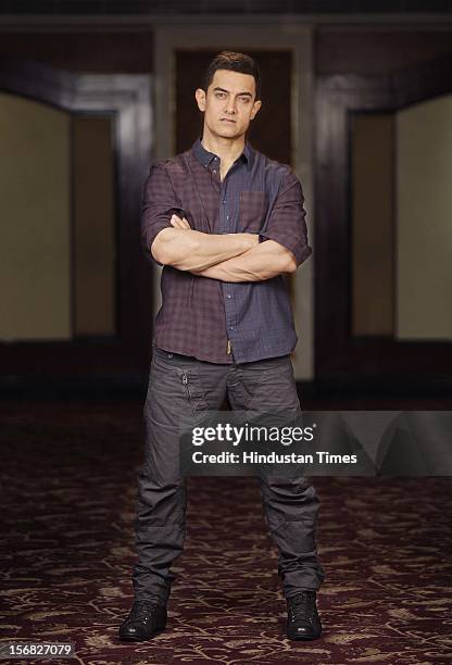 Bollywood actor Aamir Khan poses for a picture at Taj Lands End, Bandra on November 15, 2012 in Mumbai, India.