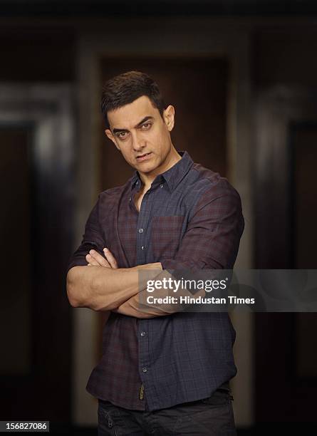 Bollywood actor Aamir Khan poses for a picture at Taj Lands End, Bandra on November 15, 2012 in Mumbai, India.