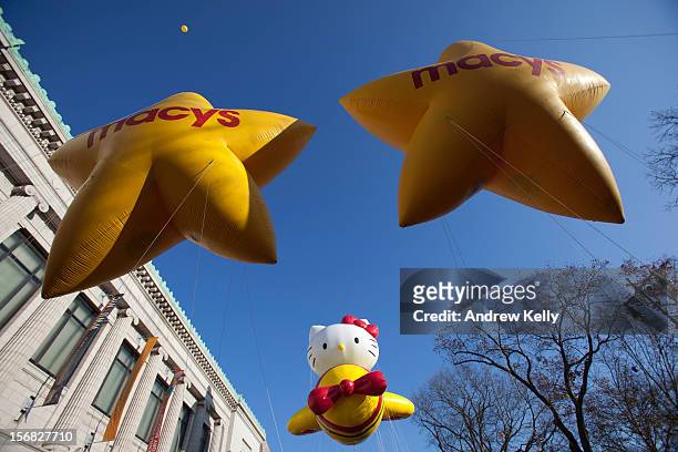 The Hello Kitty balloon makes its way through the streets of Manhattan during the 86th Annual Macy's Thanksgiving Day Parade November 22, 2012 in New...
