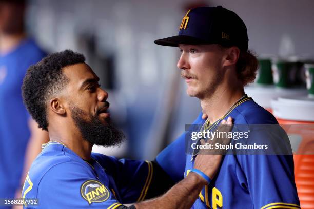 Teoscar Hernandez consoles Bryce Miller of the Seattle Mariners during the sixth inning against the Toronto Blue Jays at T-Mobile Park on July 21,...