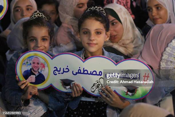 Palestinian students attend their graduation ceremony at University College of Applied Sciences on July 24, 2023 in Gaza City, Gaza.