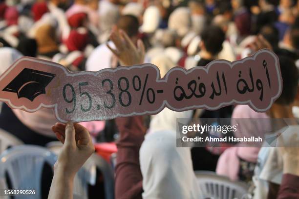 Palestinian students attend their graduation ceremony at University College of Applied Sciences on July 24, 2023 in Gaza City, Gaza.