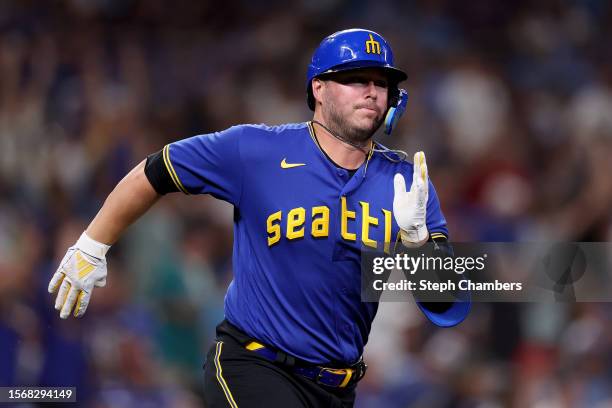 Ty France of the Seattle Mariners runs to first base against the Toronto Blue Jays at T-Mobile Park on July 21, 2023 in Seattle, Washington.