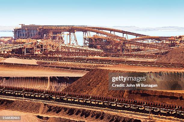 iron ore at dampier port. western australia - eisenerz stock-fotos und bilder