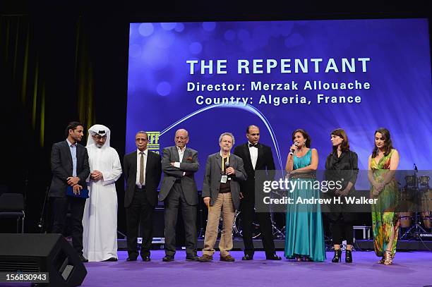 Merzak Allouache recieves the award for Best Narrative Film for 'The Repentant attends the Awards Ceremony at the Al Rayyan Theatre during the 2012...