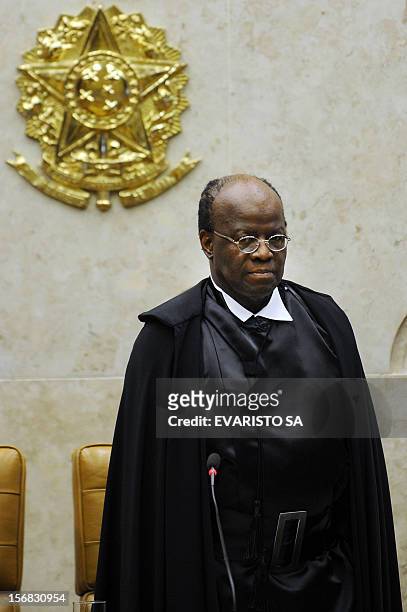 Brazil judge Joaquim Barbosa is pictured during his inauguration as Brazil's first ever black head of the Supreme Court, in a historic ceremony...