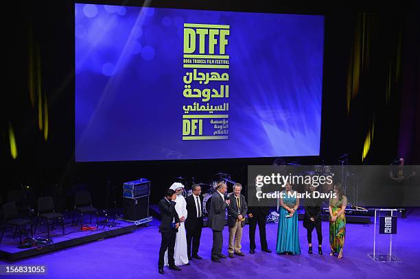 Merzak Allouache recieves the award for Best Narrative Film for 'The Repentant attends the Awards Ceremony at the Al Rayyan Theatre during the 2012...