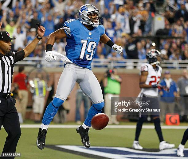 Mike Thomas of the Detroit Lions celebrates a second quarter touchdown while playing the Houston Texans at Ford Field on November 22, 2012 in...